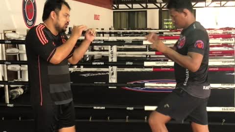 Muay Thai Tutorial: Block Knee Body Kick Counter