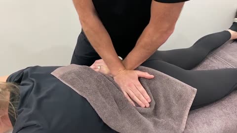 Treatment for low back stiffness into extension