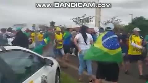 BREAKING Car hits on to peaceful protesters Brazil !!!