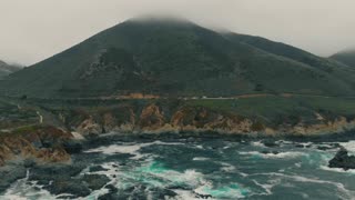 Soothing Ocean with the mountains hitting the sea