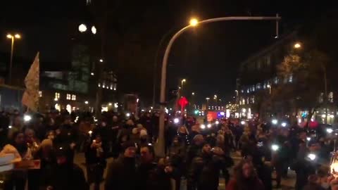 Hamburg Germany - last night lights up the streets as citizens gather together to protest for Freedom