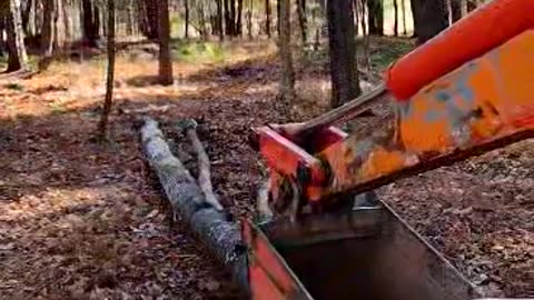 Dragging Logs With a Tractor