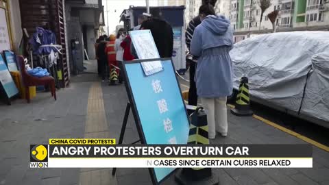 China COVID protests: People break COVID barriers in Haizhu district | World English News | WION