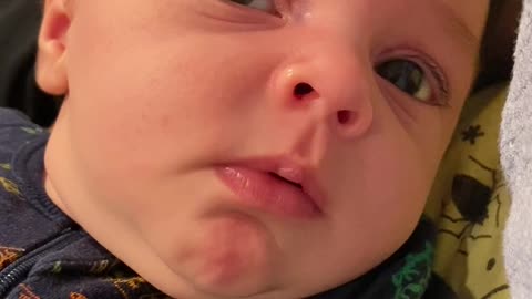 Baby Startled by Daddy's Strange Laugh
