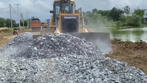 New bulldozer spreading gravel processing features building road foundation-14