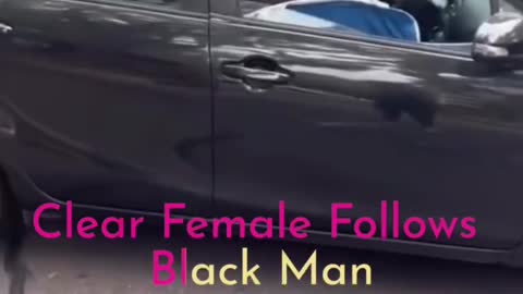 Clear Female Follows Black Man