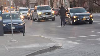 "Crazy" guy walking in the middle of the road