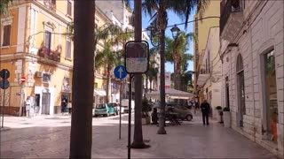 Walking along Corso Roma in Brindisi, Italy