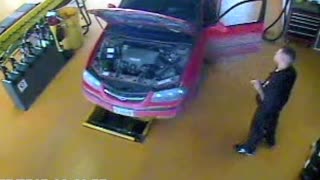 Chevy Impala catches on fire in service shop