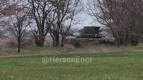 A Russian T-72B3 fires from the left bank of the Dnieper to the right.