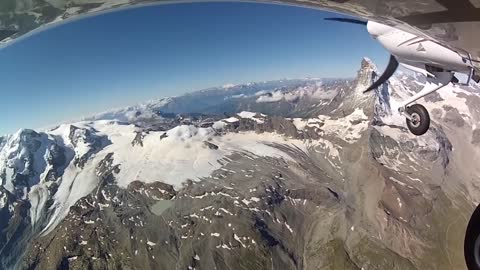 Flying over the Swiss Alps to the sound of relaxing music
