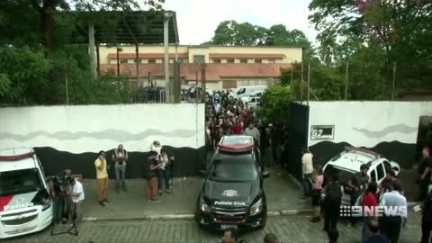 10 killed in brutal Brazil school shooting | Nine News Australia