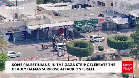 Group Of Palestinians In Gaza Strip Celebrates Hamas Attack On Israel