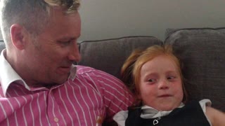 Little girl reacts to Daddy's new hairstyle