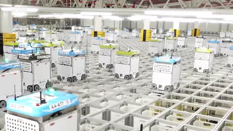 Inside A Warehouse Where Thousands Of Robots Pack Groceries