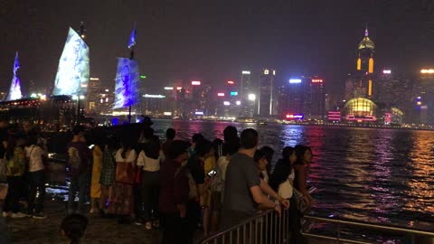 View of Downtown Hong Kong Lights and Junk