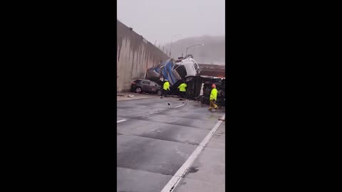 Huge Box Truck Topples Off Freeway to Accident Below