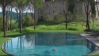 Tuscany's Aquatic Oasis: Dive into the Serenity of Nature's Swimming Pool