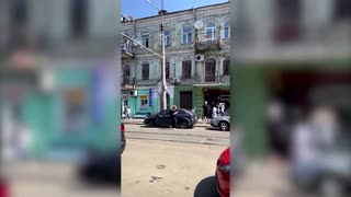 Children run screaming on Kyiv street during attack