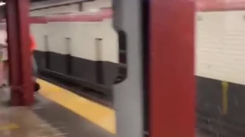 Water pours down 42ndStreet subway