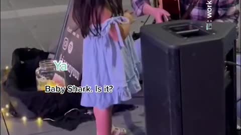 Orchard busker fulfills toddler's 'Baby Shark' song request
