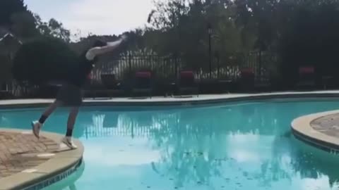 Guy Works Out An Insane Flip Over A Pool And Lands On The Other Side!