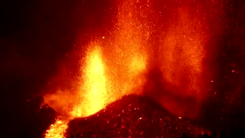 Lava spews as Canary Islands volcano erupts