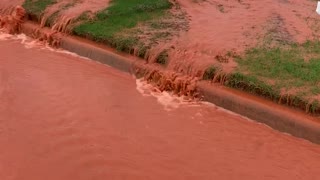 Busted Water Line Mixed with Red Clay