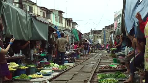 Maeklong Railway Market