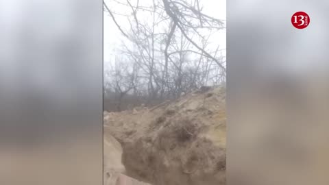 Ukrainian soldier fighting against Russians in the trench alon