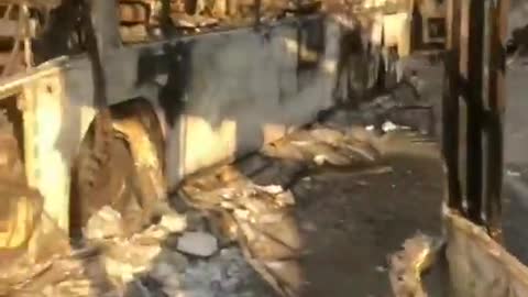 Burnt out bus barricade in Mariupol