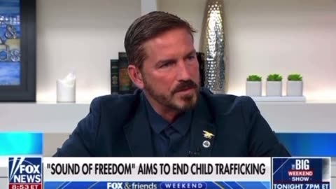 Jim Caviezel handing out red pills about child sex trafficking