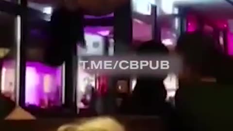 stripper hanging off the ceiling drops on her head onto bar.