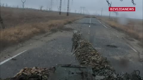 A Russian tank breaks through