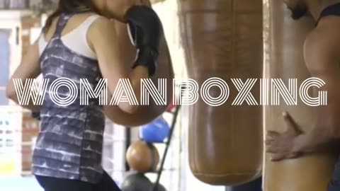 Woman boxing bag