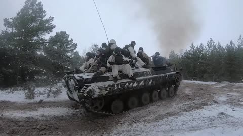 Russia Shows Infantry Practising Storming Fortified Areas With Tanks In Winter Conditions In Belarus