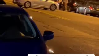 Man intentionally runs into a woman with his car. * Warning Graphic