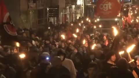 Torchlit rally held in Nantes as protesters march against pension reform