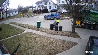 Garbage Collector Falls Over Trying to Toss Dresser