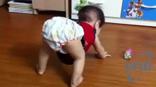 Baby engrossed playing - FUNNY BABY VIDEO