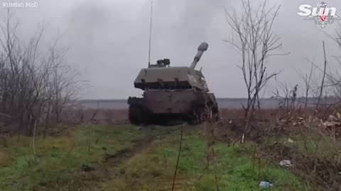 Russian soldiers fire self-propelled Howitzers at Ukrainian battlefield targets