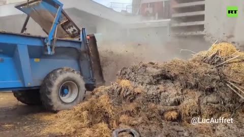 Farmers dump massive loads of manure onto French street