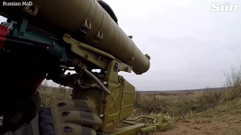 Russian conscripts train using rocket launchers in harsh weather conditions