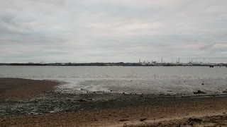 Beach at the end of river on the solent uk