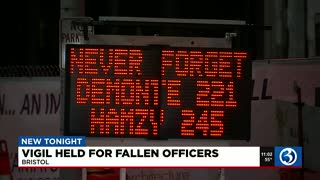 Vigil held for fallen officers one month later