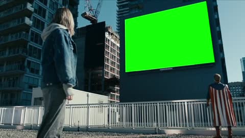 Homelander Looking at a Big Green Screen