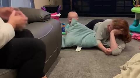 Pillow Fight has Baby Belling Laughing