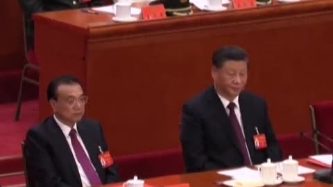 Former Chinese president Hu Jintao escorted out of the CCP party congress on live TV