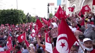 Tunisians protest against president's power grab