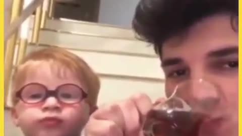 LIL KID KNOWS THE RIGHT WAY TO DRINK TEA